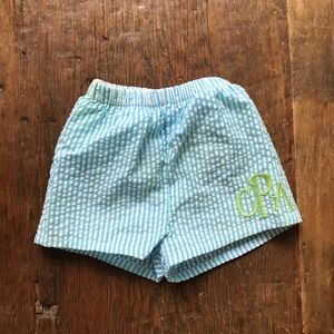 Baby Seer sucker swim trunks.